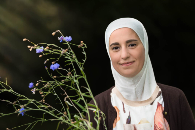 Edinburgh branding photographer - photo shoot in Scotland - headshot of woman with flowers