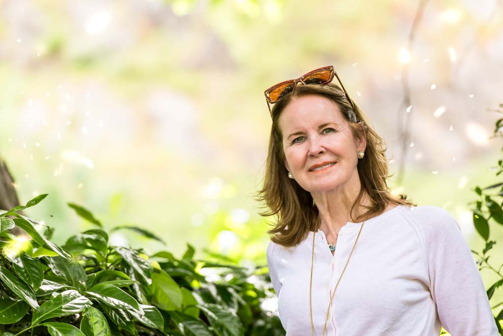 Brand photographer Edinburgh Scotland | Seasonal brand photography for small business owner woman with sunglasses on her head wearing white cardigan