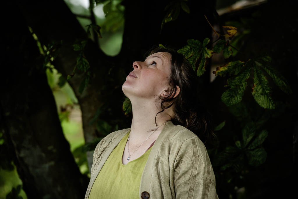 Brand photographer Moray Scotland - woman looking up into tree